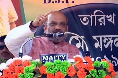 Paschim Medinipur: BJP chief Amit Shah addresses a public rally in Paschim Medinipur, West Bengal, on May 7, 2019. (Photo: IANS)