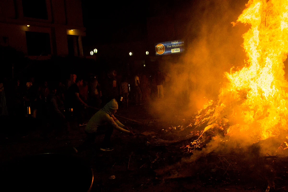 The Grand ‘Holika Dahan’ being performed outside the Banke Bihari temple.