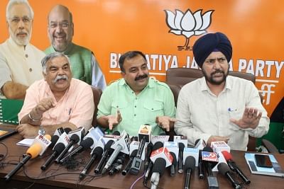 Jammu: BJP leaders Narinder Singh, Vikram Randhawa and Anil Gupta address a press conference in Jammu, on May 8, 2019. BJP on Wednesday denied allegations made by journalists of Leh press club that the party had tried to bribe them. (Photo: IANS)