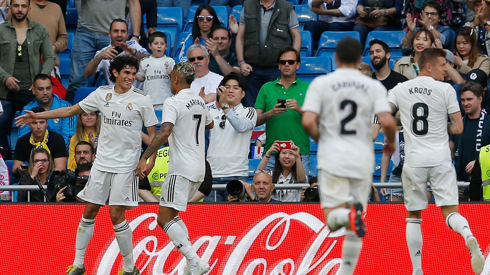 Real Madrid players celebrate a goal against Villarreal.