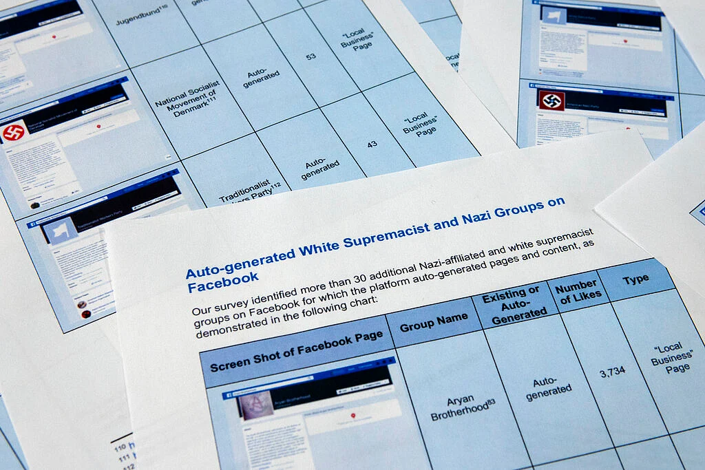 Pages from a confidential whistleblower’s report obtained by <i>The Associated Press</i> are photographed on 7 May 2019, in Washington. 