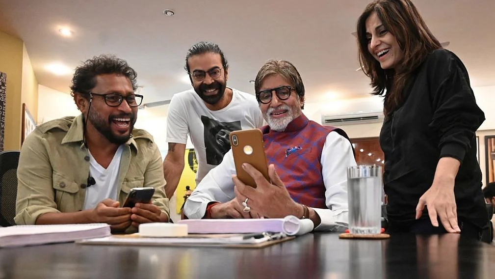Shoojit Sircar, Ronnie Lahiri, Amitabh Bachchan and Juhi Chaturvedi share a laugh at Bachchan’s office.
