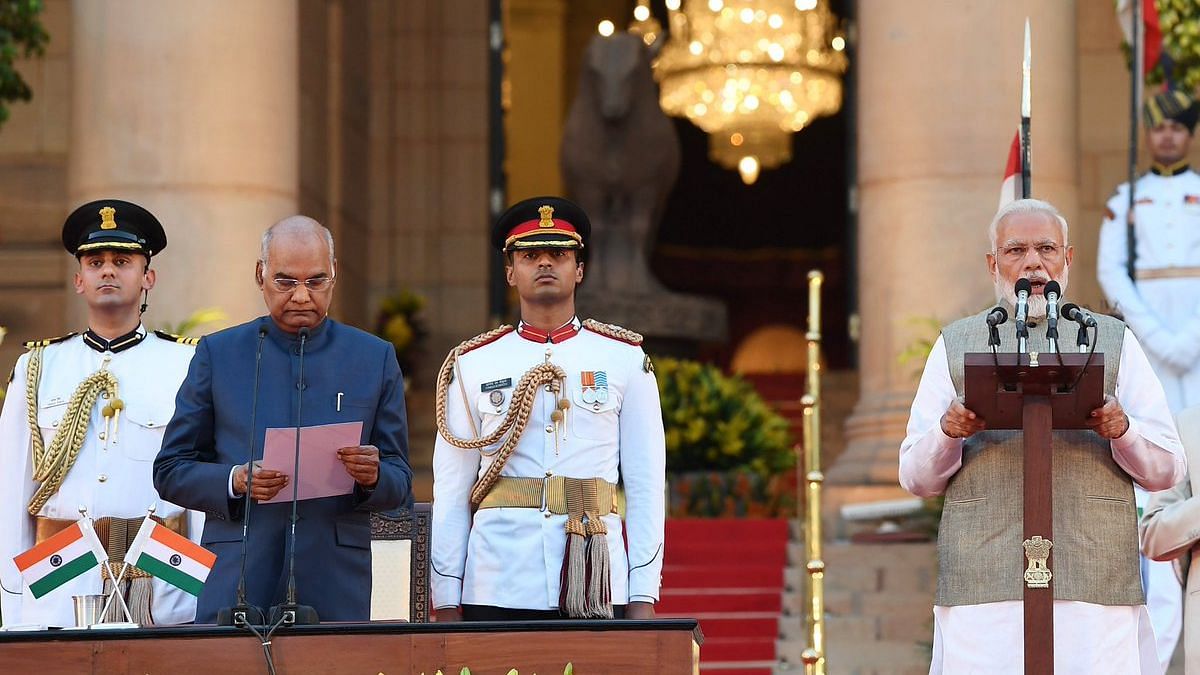 President Ram Nath Kovind administers the oath of office to Prime Minister Narendra Modi.&nbsp;