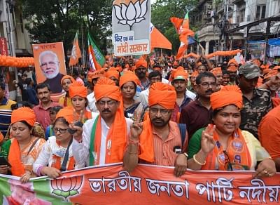 Kolkata: BJP supporters participate in party chief Amit Shah
