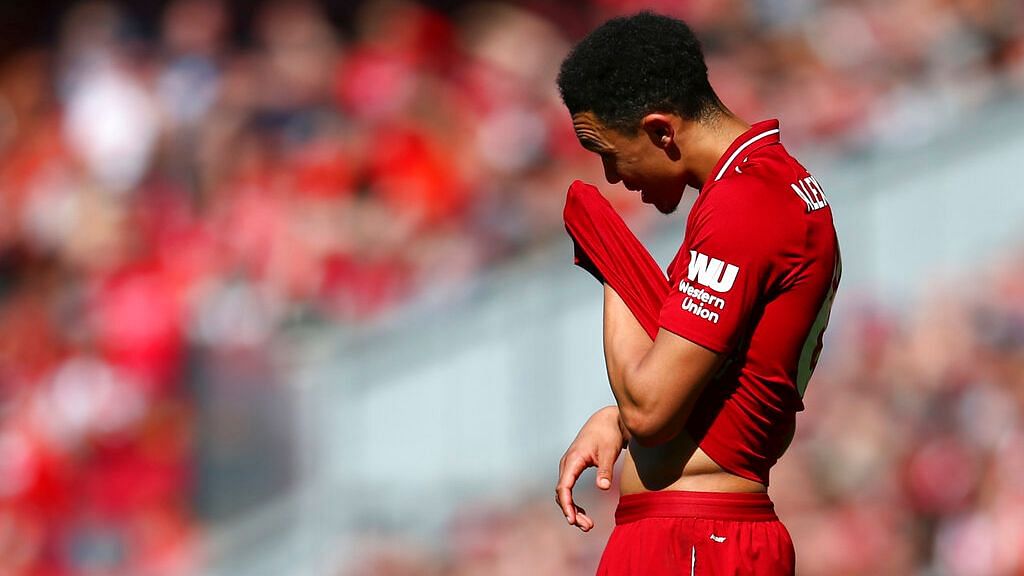 Liverpool’s Trent Alexander-Arnold reacts during the English Premier League football match between Liverpool and Wolverhampton Wanderers at the Anfield stadium in Liverpool on 12 May.&nbsp;