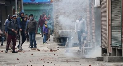 Srinagar: Protesters clash with security personnel after National Investigation Agency (NIA) raided the Srinagar residence of Jammu and Kashmir Liberation Front (JKLF) chairman Yasin Malik, in Srinagar on Feb 26, 2019. (Photo: IANS)