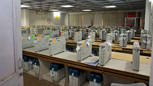 Cases containing electronic voting machines sit in a strong room. For representational purposes only.