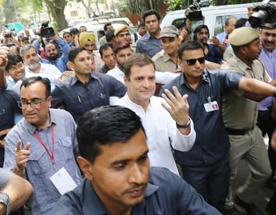 New Delhi: Congress President Rahul Gandhi accompanied by party leader Ajay Maken arrives to cast his vote during the sixth phase of 2019 Lok Sabha elections, in New Delhi on May 12, 2019. (Photo: IANS)
