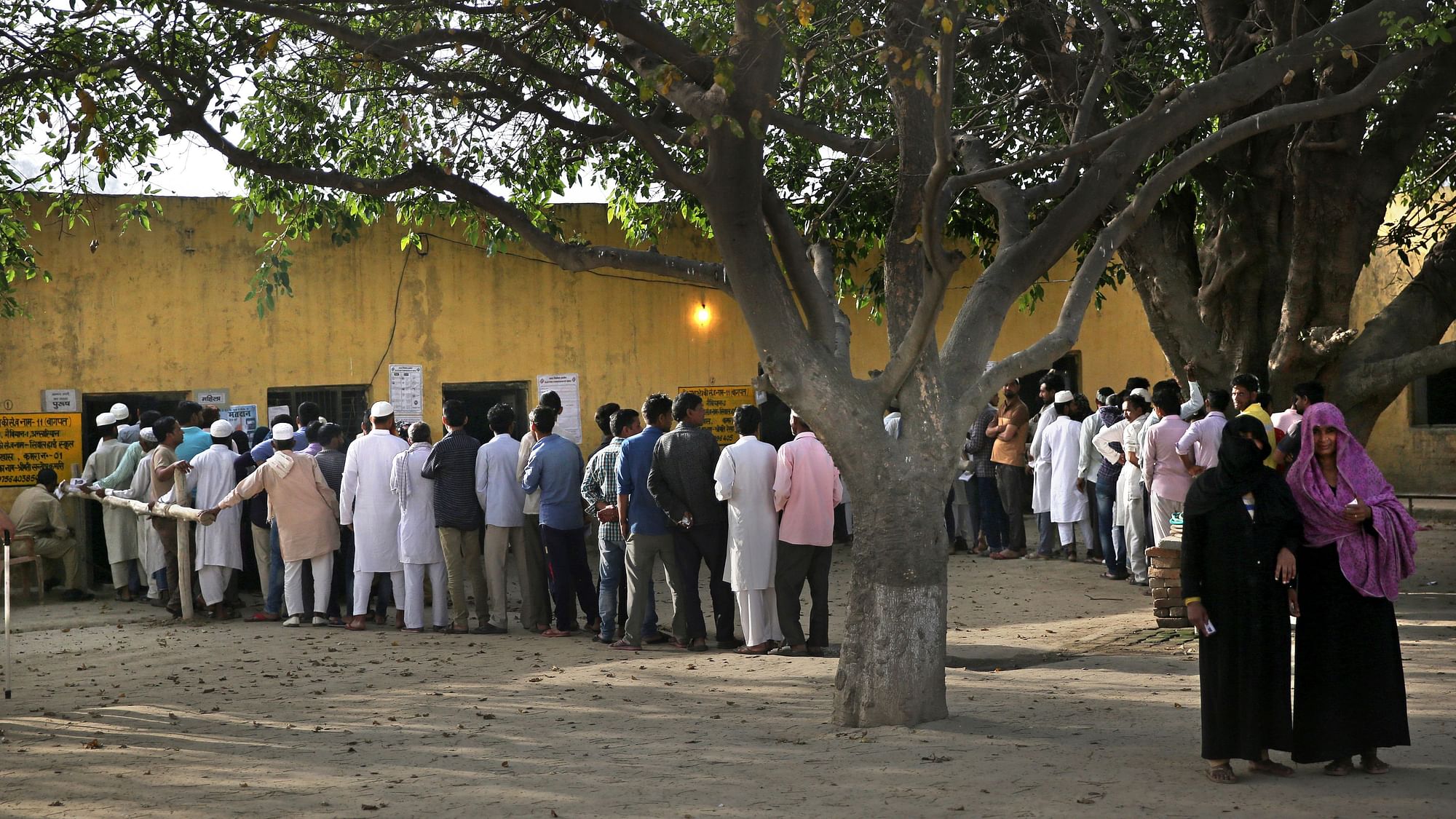 Voters in a queue.