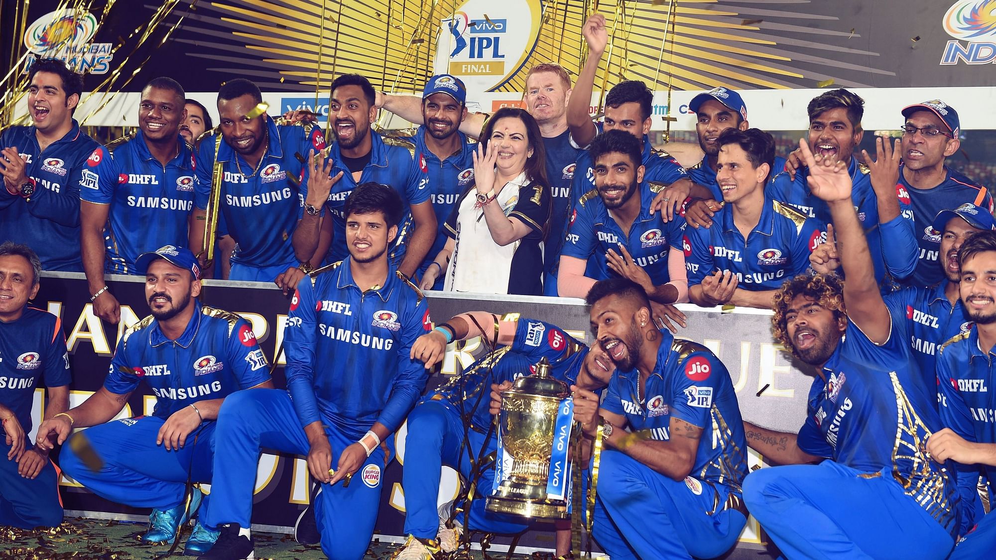 Mumbai Indians players celebrate their fourth IPL title.