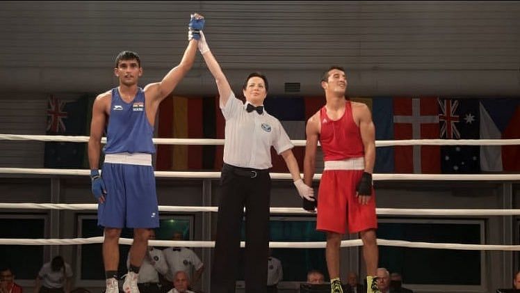 Indian boxer Manish Kaushik wins gold in the XXXVI Feliks Stamm International Boxing Tournament against Morocco’s Mohamed Hamout.