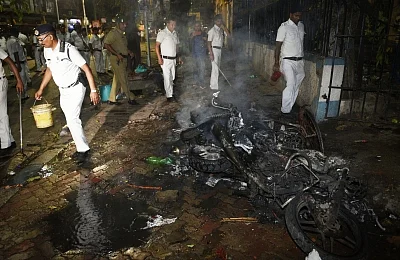 Kolkata: A view of three motorbikes which were set ablaze in the College Street area after Trinamool Congress Chhatra Parishad activists allegedly pelted stones at BJP President Amit Shah