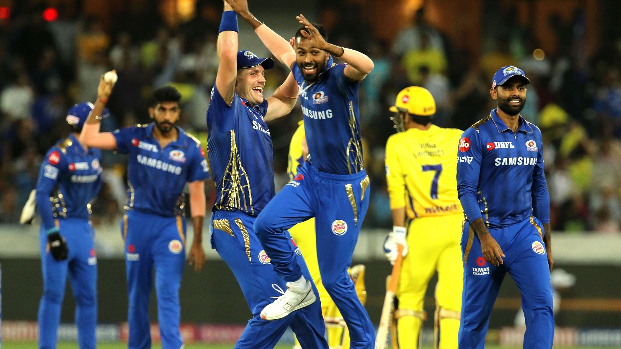 Mumbai Indians players celebrate the run out that sent MS Dhoni back to the dressing room on 2.