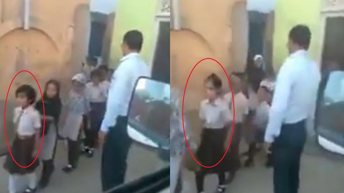 A video of a man hitting girls has gone viral with claims that he is ‘punishing’ the girls for not wearing a hijab.