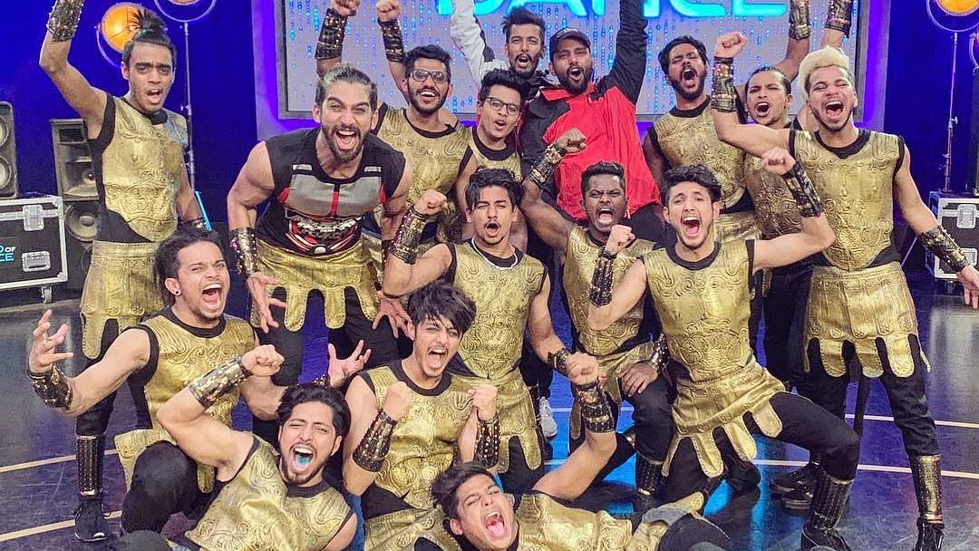 The Kings group rejoice after their victory at <i>World of Dance</i>.