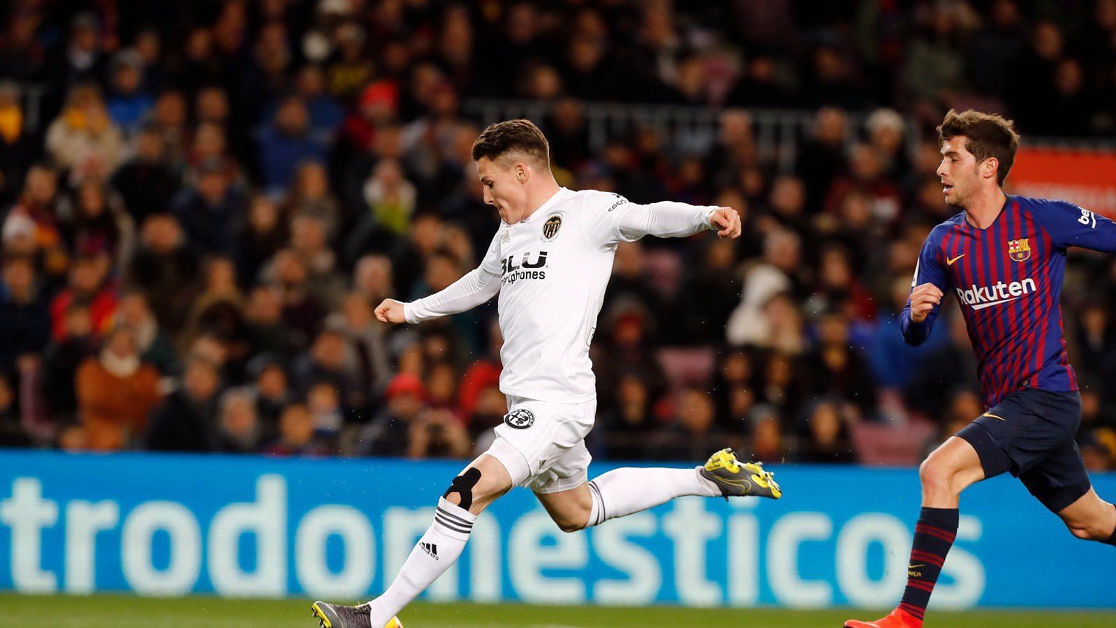 Valencia striker Kevin Gameiro in action during a match against FC Barcelona.