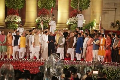 New Delhi: President Ram Nath Kovind, Vice President M Venkaiah Naidu and Prime Minister Narendra Modi with Union cabinet ministers during the swearing-in ceremony at Rashtrapati Bhavan in New Delhi on May 30, 2019. (Photo: Amlan Paliwal/IANS)