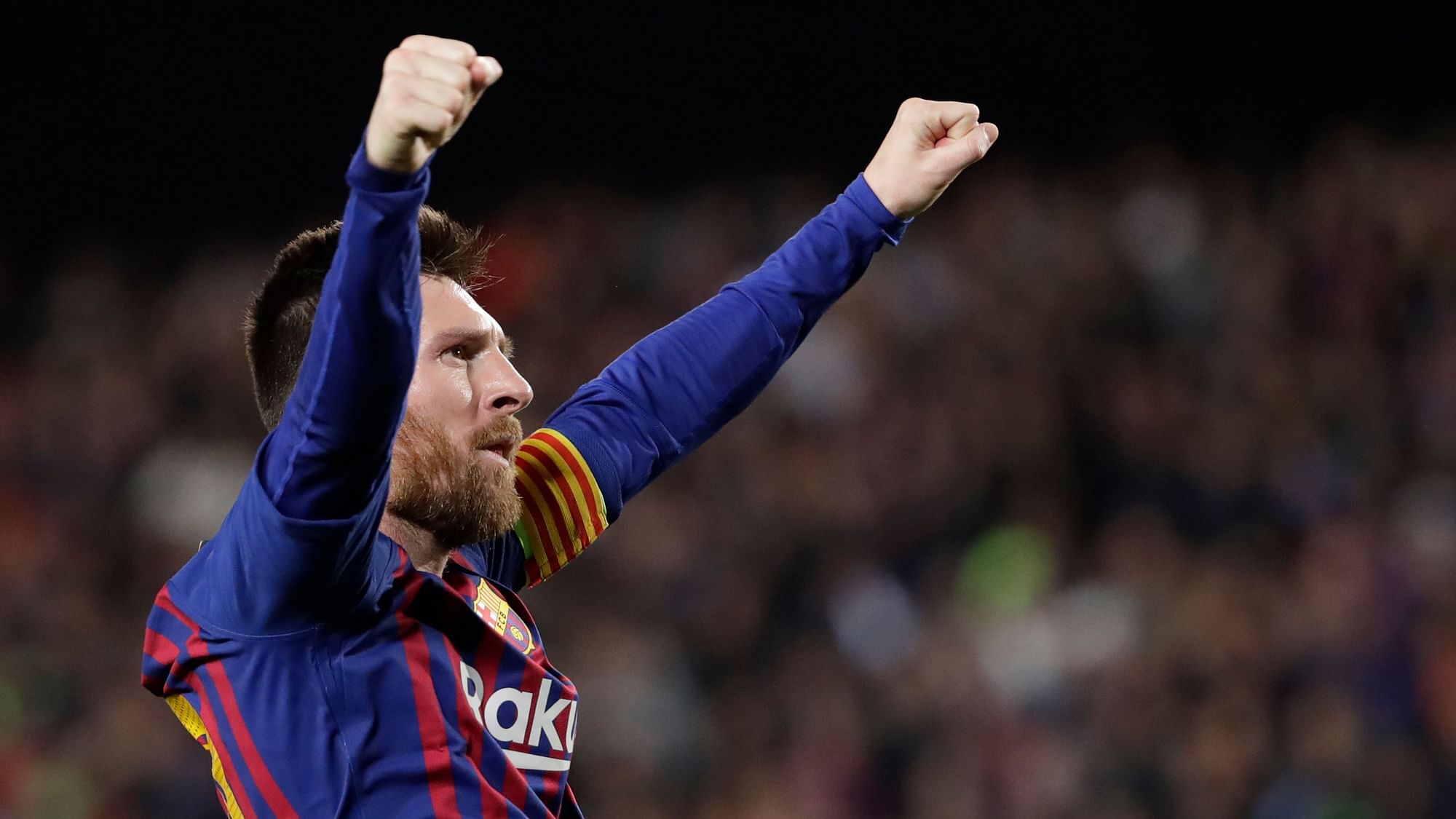 Barcelona’s Lionel Messi celebrates after scoring his side’s third goal.