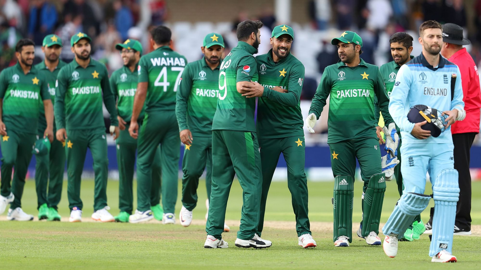 Pakistan players congratulate each other after their win over England in the Cricket World Cup match at Trent Bridge in Nottingham, Monday, June 3, 2019.&nbsp;