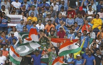 Dubai: Fans of India and Pakistan cheer for their respective teams during the third match of Asia Cup 2018 Super Four between India and Pakistan at Dubai International Cricket Stadium in Dubai, UAE on Sept 23, 2018. (Photo: Surjeet Yadav/IANS)