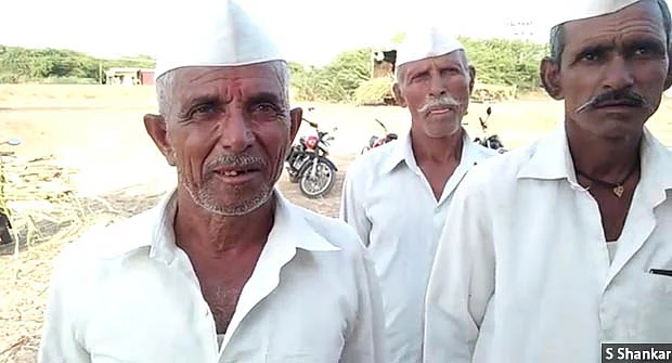 “The seeds that I had sown last year did not even sprout,” says 70-year-old Pandurang Mane (left) from drought-hit Athani taluka in northern Karnataka. His income has been reducing every year, he says, and he cannot get work as a farmhand at his age. 