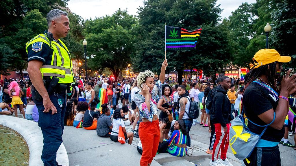 A panic caused by a mistaken belief that a gun had been fired during a pride parade in Washington DC sent people running through the city’s streets.