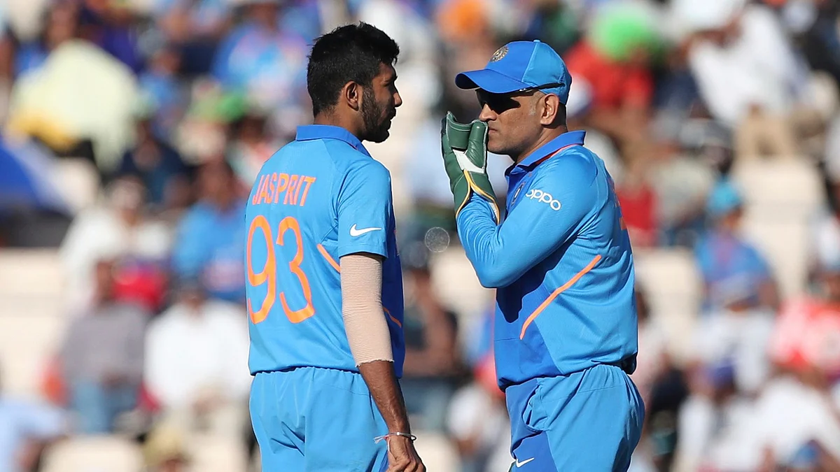 MS Dhoni is often seen discussing strategies with bowlers during a match.