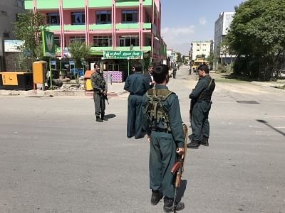 KABUL, June 2, 2019 (Xinhua) -- Afghan policemen inspect the site of serial bomb blasts in western Kabul, capital of Afghanistan, June 2, 2019. At least one person was killed and several others wounded after serial bomb blasts rocked western side of Afghanistan