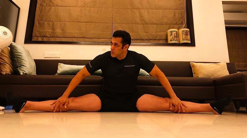 Salman Khan does a split.