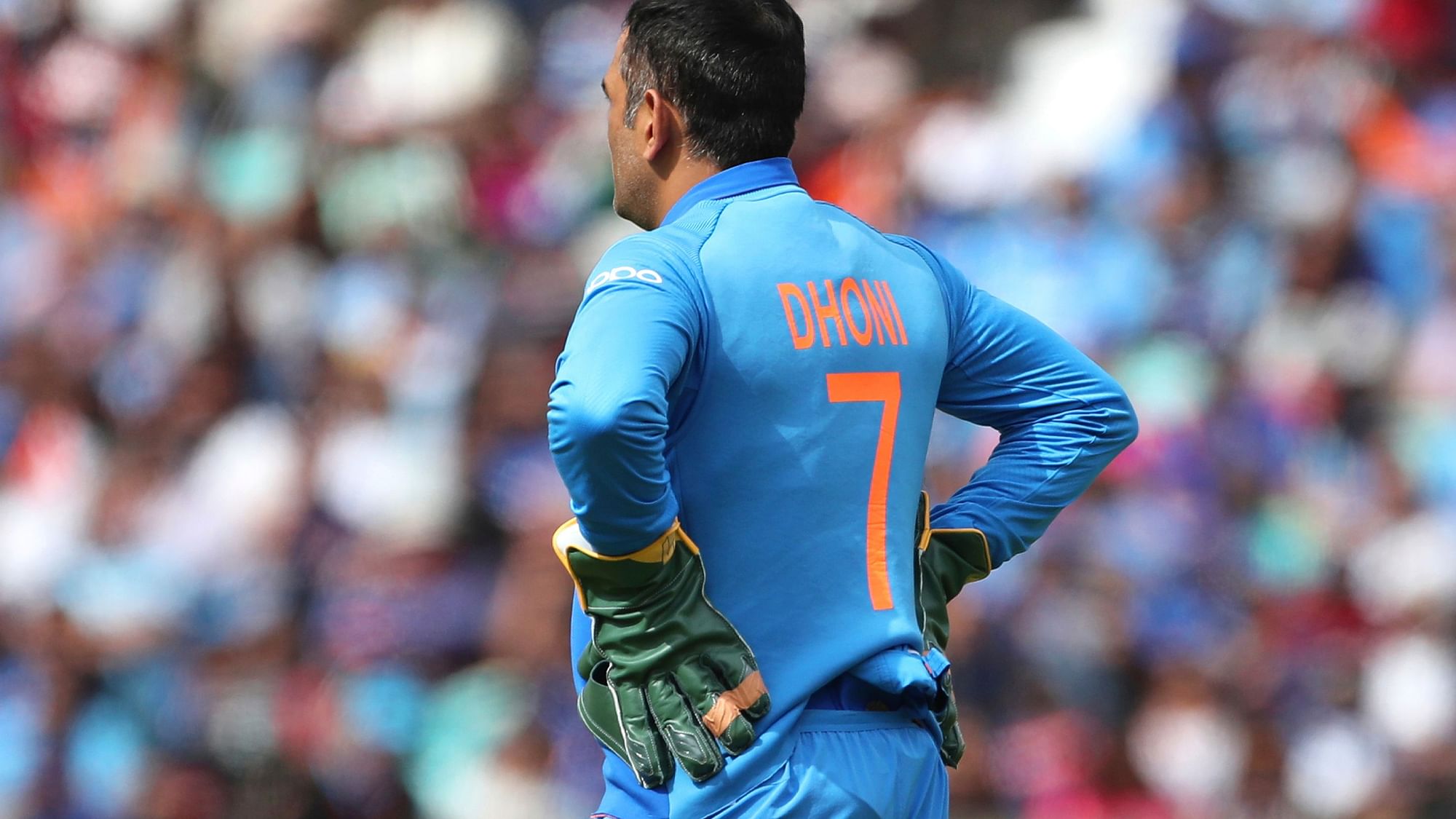 Dhoni was also seen wearing the dagger-free gloves when India came onto the field after they set Australia a target of 353.