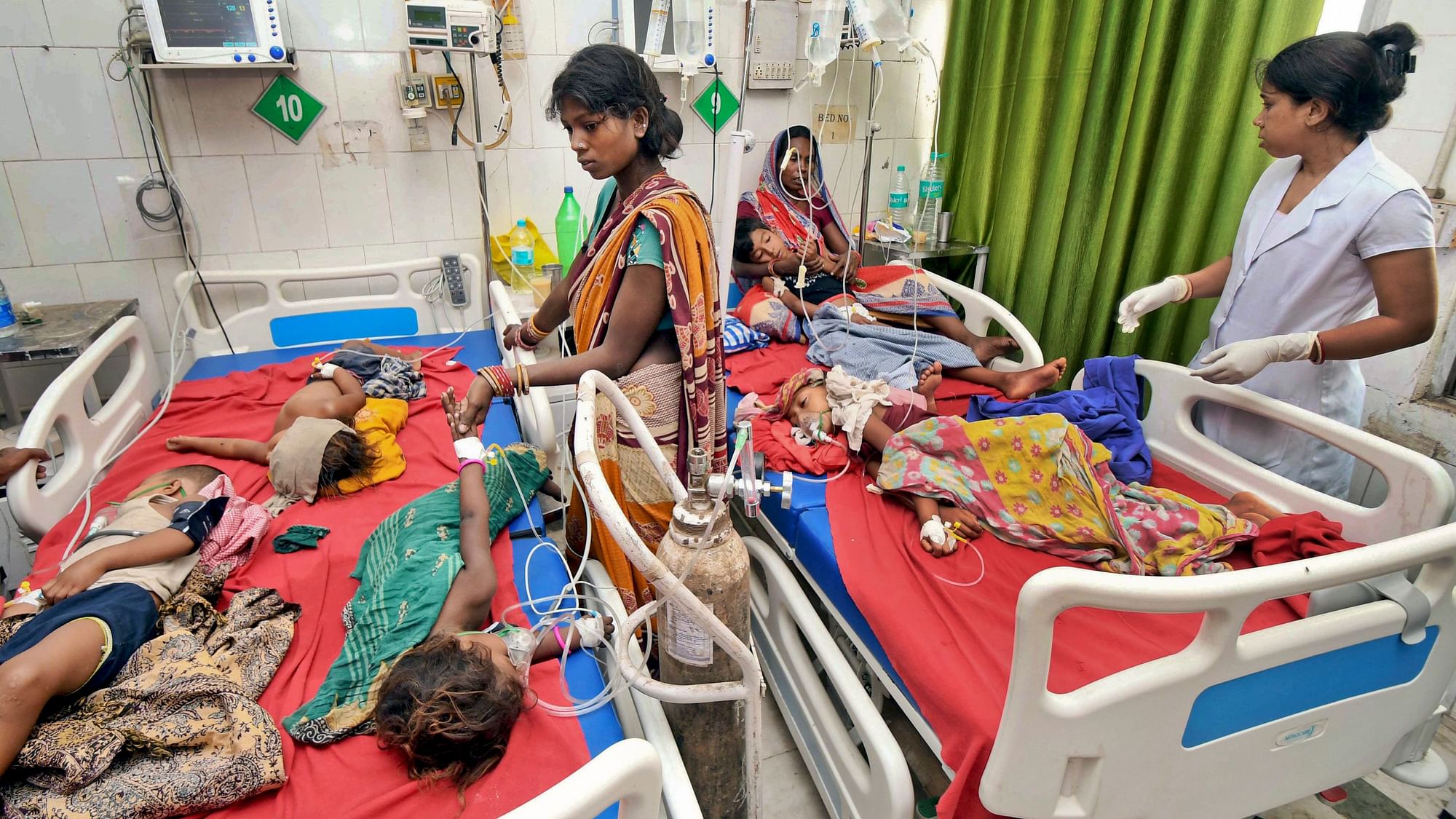 Children showing symptoms of Acute Encephalitis Syndrome undergo treatment at Sri Krishna Medical College Hospital in Muzaffarpur, Bihar.
