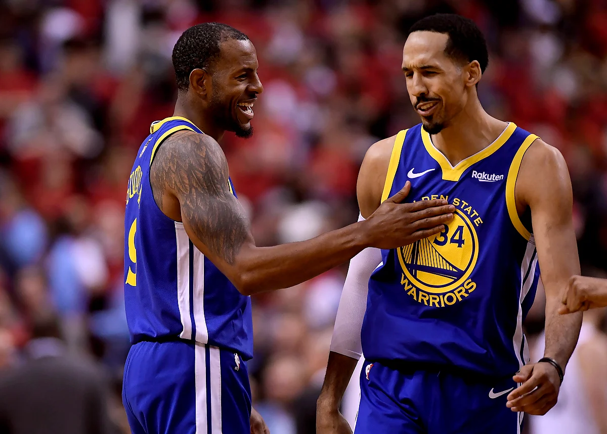 Golden State Warriors forward Andre Iguodala (9) and teammate Shaun Livingston (34) celebrate their win against the Toronto Raptors.