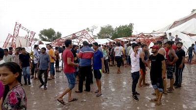 Barmer: People gathered at the site where a massive tent erected for people attending a religious gathering collapsed during a dust storm in Rajasthan