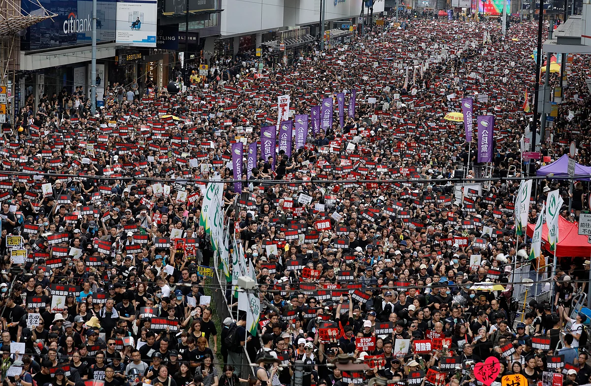 Tens of thousands of Hong Kong residents, mostly in black, have jammed the city’s streets Sunday to protest the government’s handling of a proposed extradition bill.