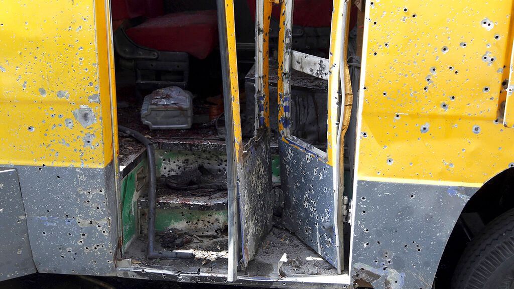 A damaged bus sits at the scene of an explosion in Kabul, Afghanistan on 2 June 2019. &nbsp;