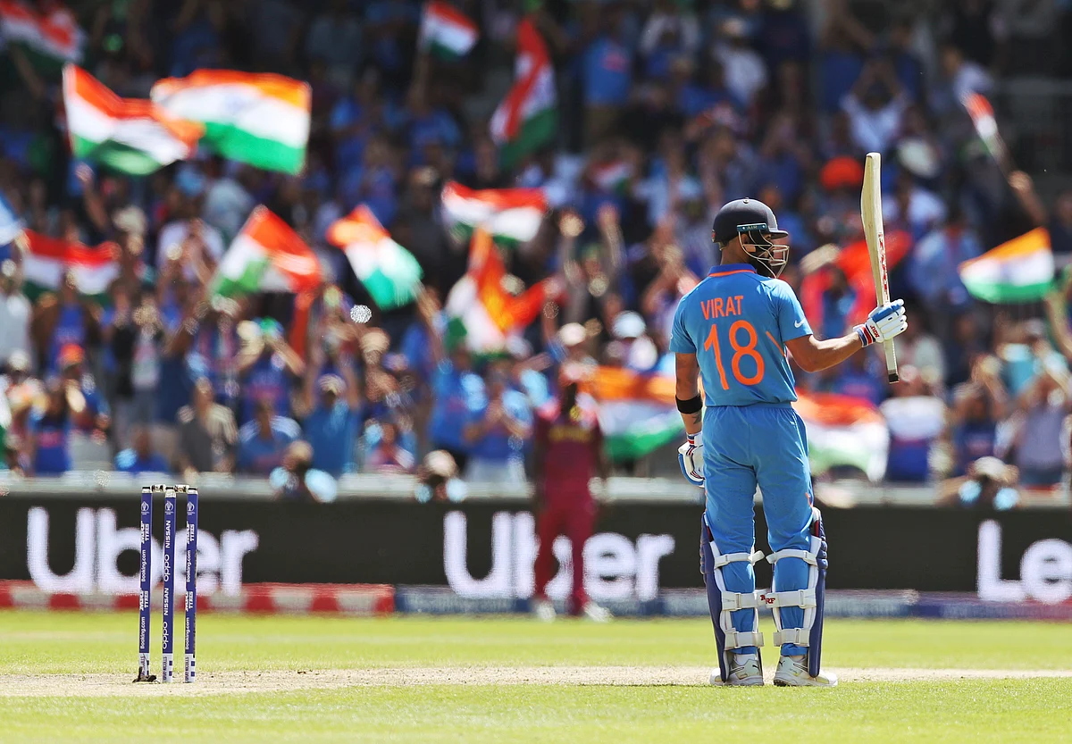 Virat Kohli celebrates his half century vs West Indies.