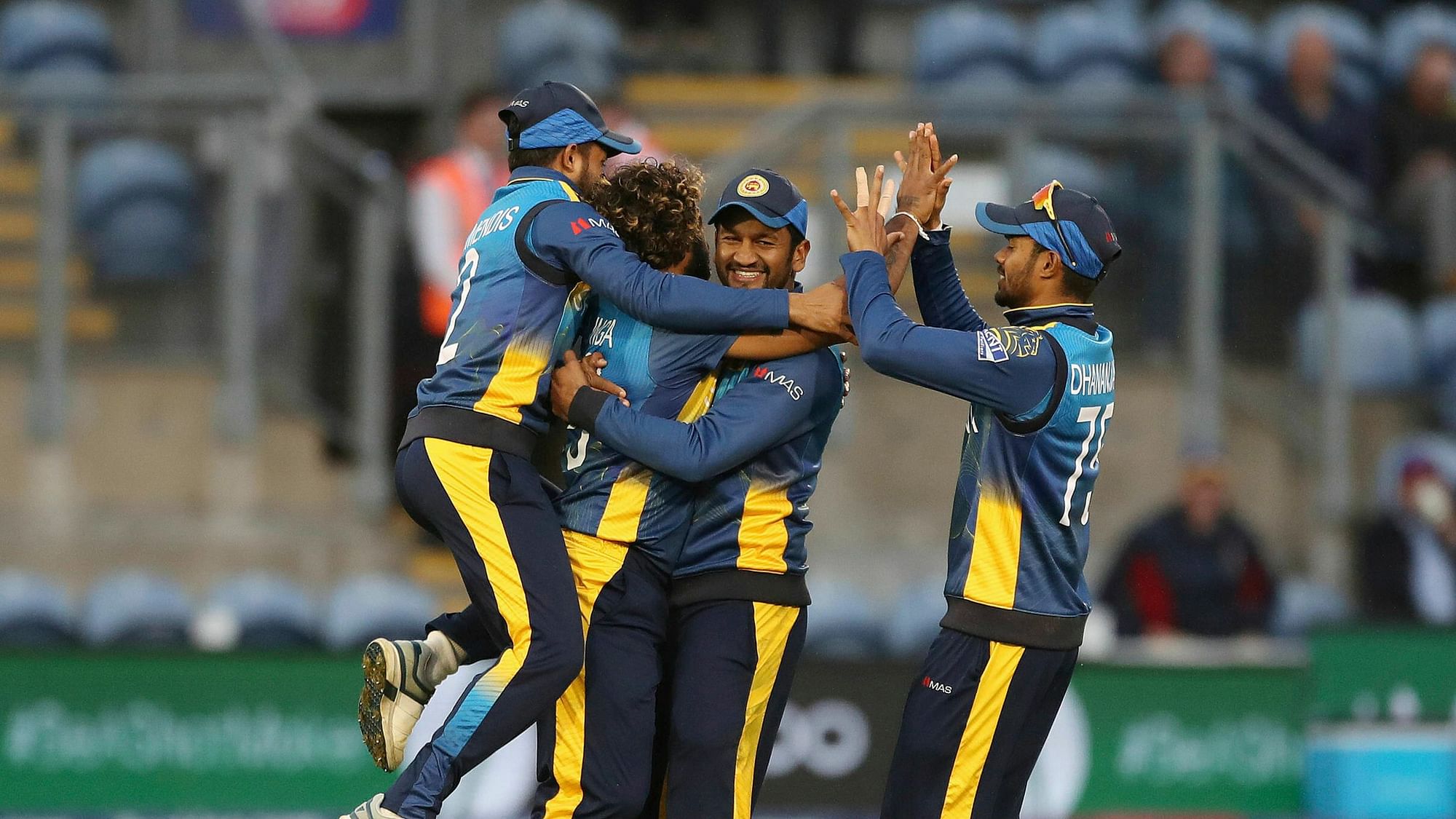 Sri Lanka celebrate their victory over Afghanistan, during the Cricket World Cup group stage match in Cardiff.&nbsp;