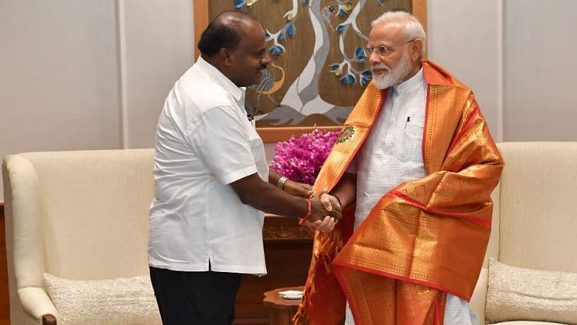 Karnataka Chief Minister HD Kumaraswamy and PM Narendra Modi.