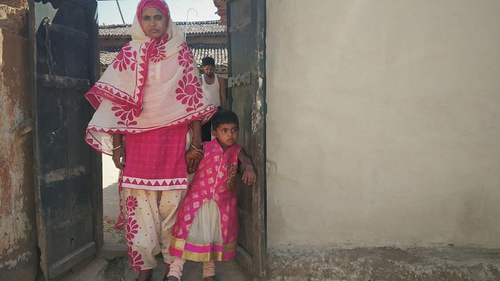 Saira Bibi and her daughter at the family’s house in Nawada village of Jharkhand’s Latehar district. Manowar Ansari is seen in the background. Manowar  was shocked to see that the two men leading the mob were his brother’s acquaintances
