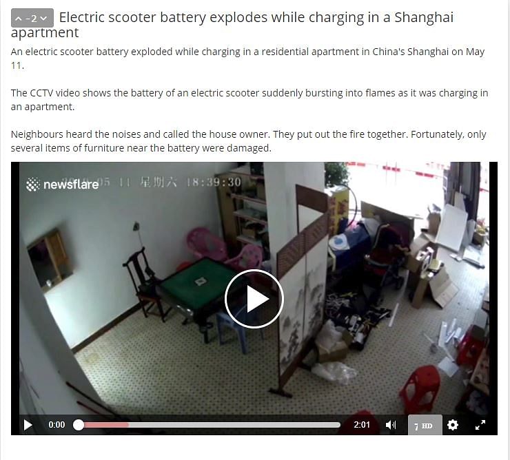 The video does not show a phone exploding while on charge, but the battery of an electric scooter in Shanghai.