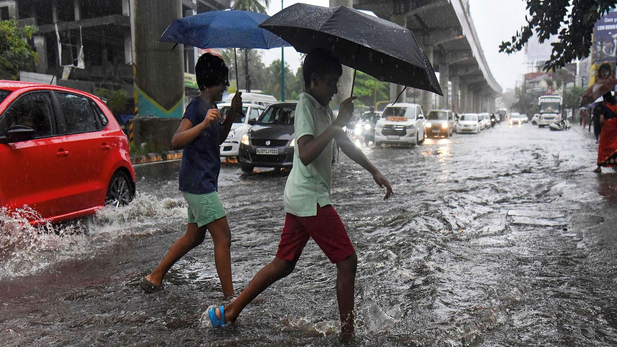 A view of a flooded road after Monsoon rains in Kochi, Sunday, 9 June. The Meteorological Department said the low pressure was expected to intensify into a depression in the next two days and subsequently, into a cyclone.