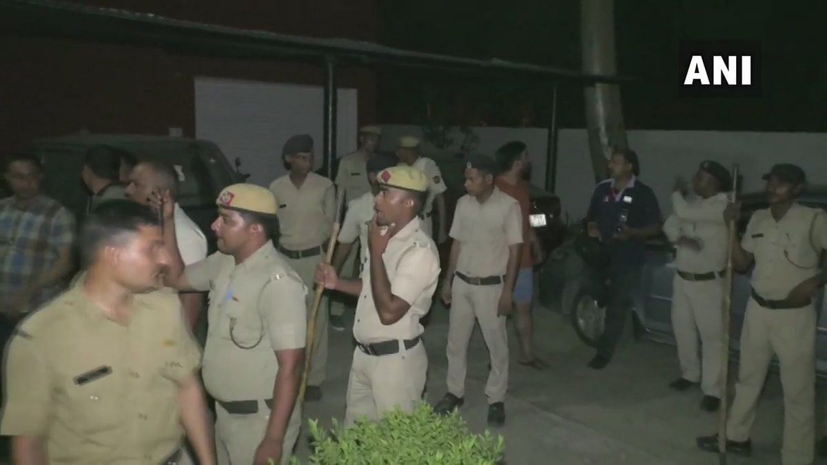 Police gather outside the hospital in Haryana after the incident.&nbsp;
