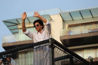 Mumbai: Actor Shahrukh Khan during a fan meet from the balcony of Mannat on Eid-ul-Fitr celebrations, in Mumbai, on June 5, 2019. (Photo: IANS)
