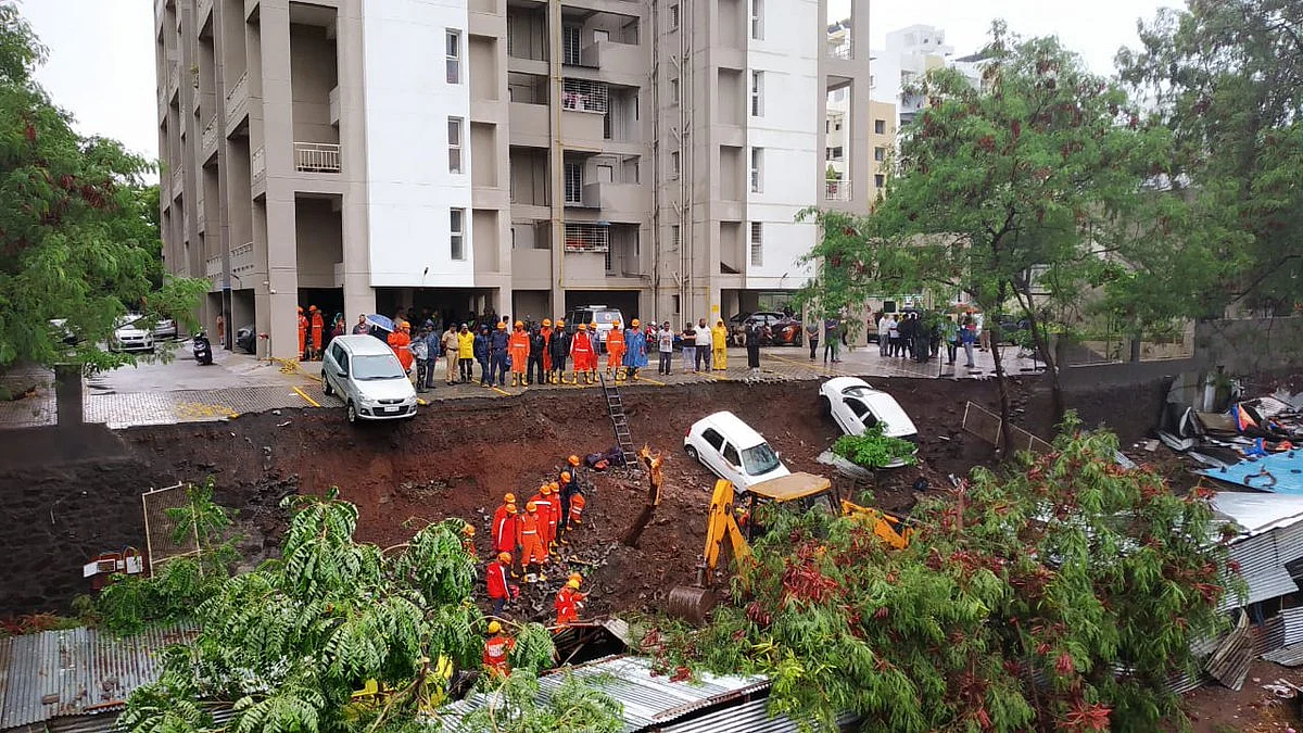 Rescue efforts at the site of the wall collapse in Kondhwa, Pune.