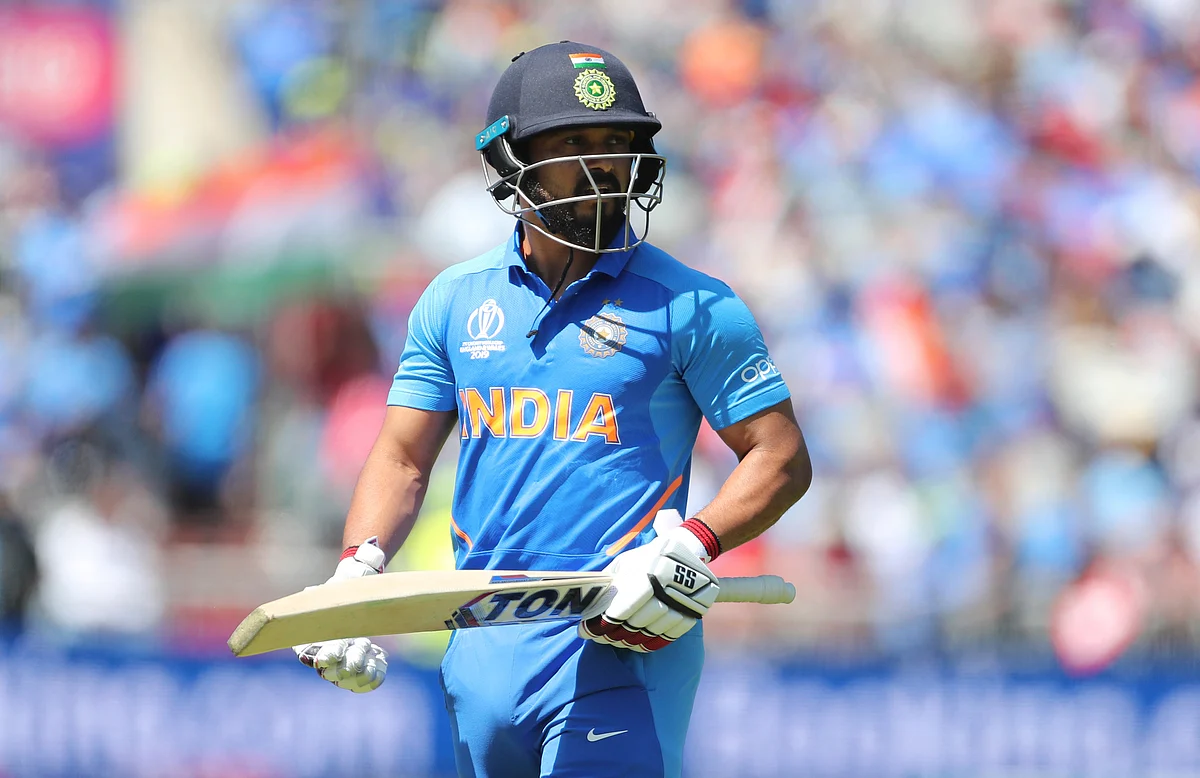 India’s Kedar Jadhav leaves the field after being dismissed by West Indies’ Kemar Roach during the Cricket World Cup match between India and West Indies.