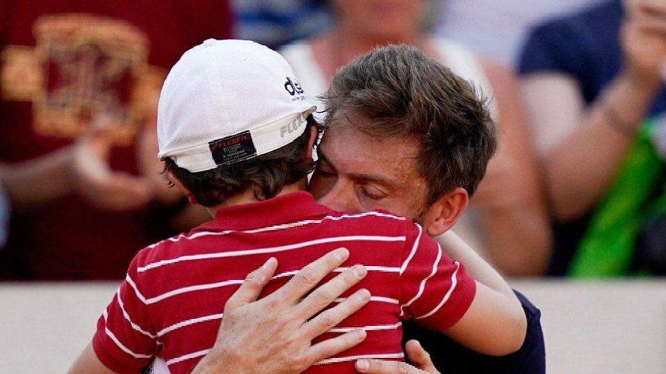 Mahut was consoled by his 7-year-old son after his loss at the French Open.