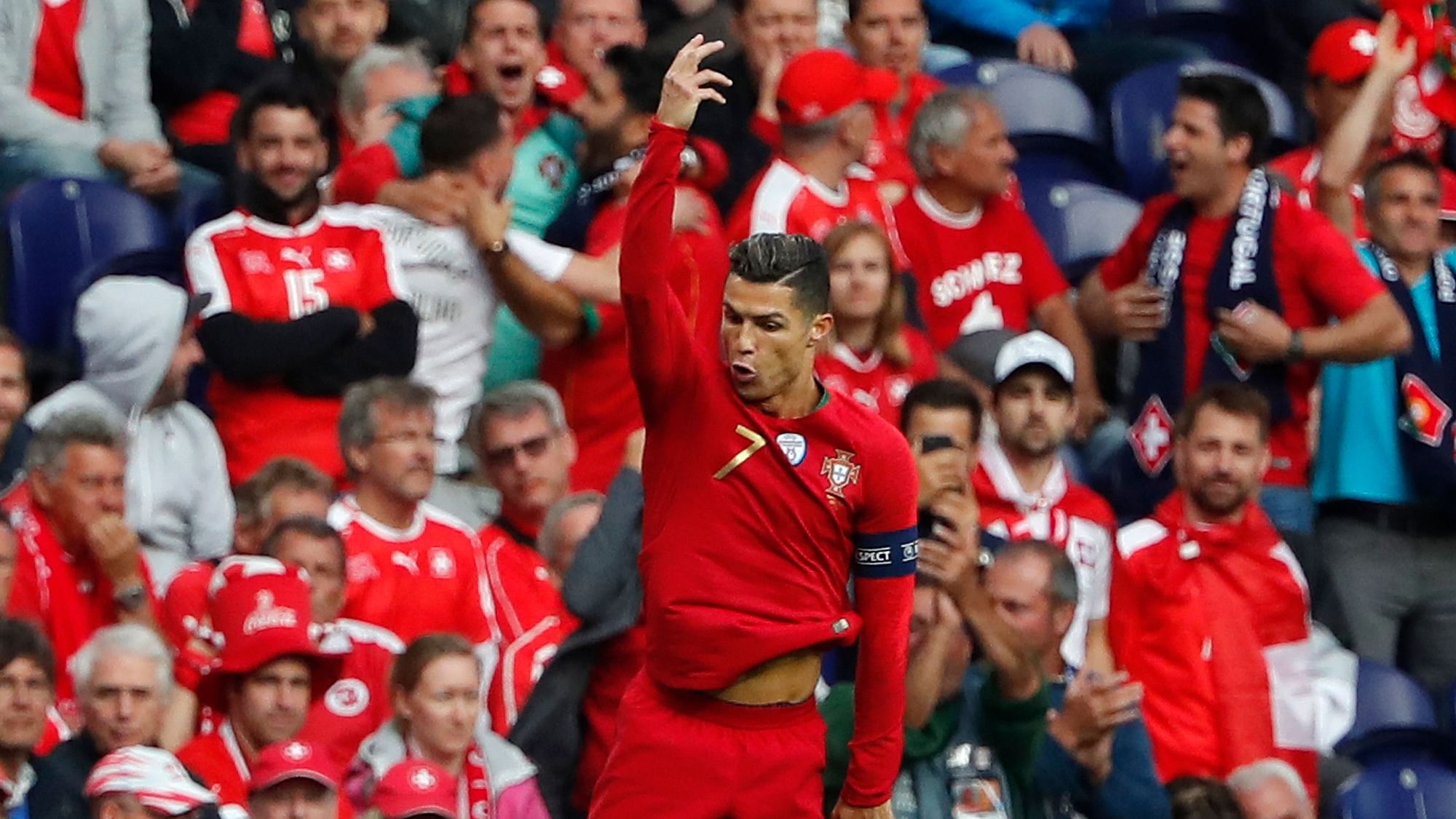 Cristiano Ronaldo celebrates after scoring his side’s opening goal during the UEFA Nations League semifinal.