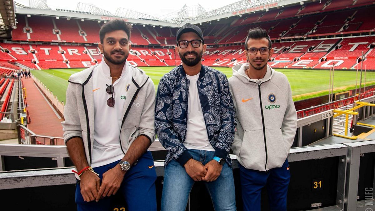 Vijay Shankar, Dinesh Karthik, Yuzvendra Chahal at the Old Trafford Football Stadium.