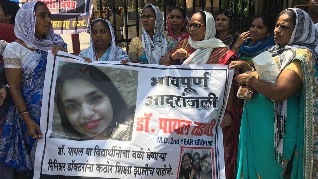 Friends and family of doctor Payal Tadvi protesting at the state-run hospital in Mumbai, where she worked