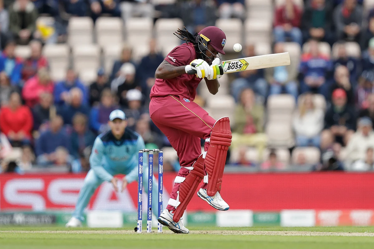 West Indies’ Chris Gayle avoids a bouncer during the Cricket World Cup match between England and West Indies.
